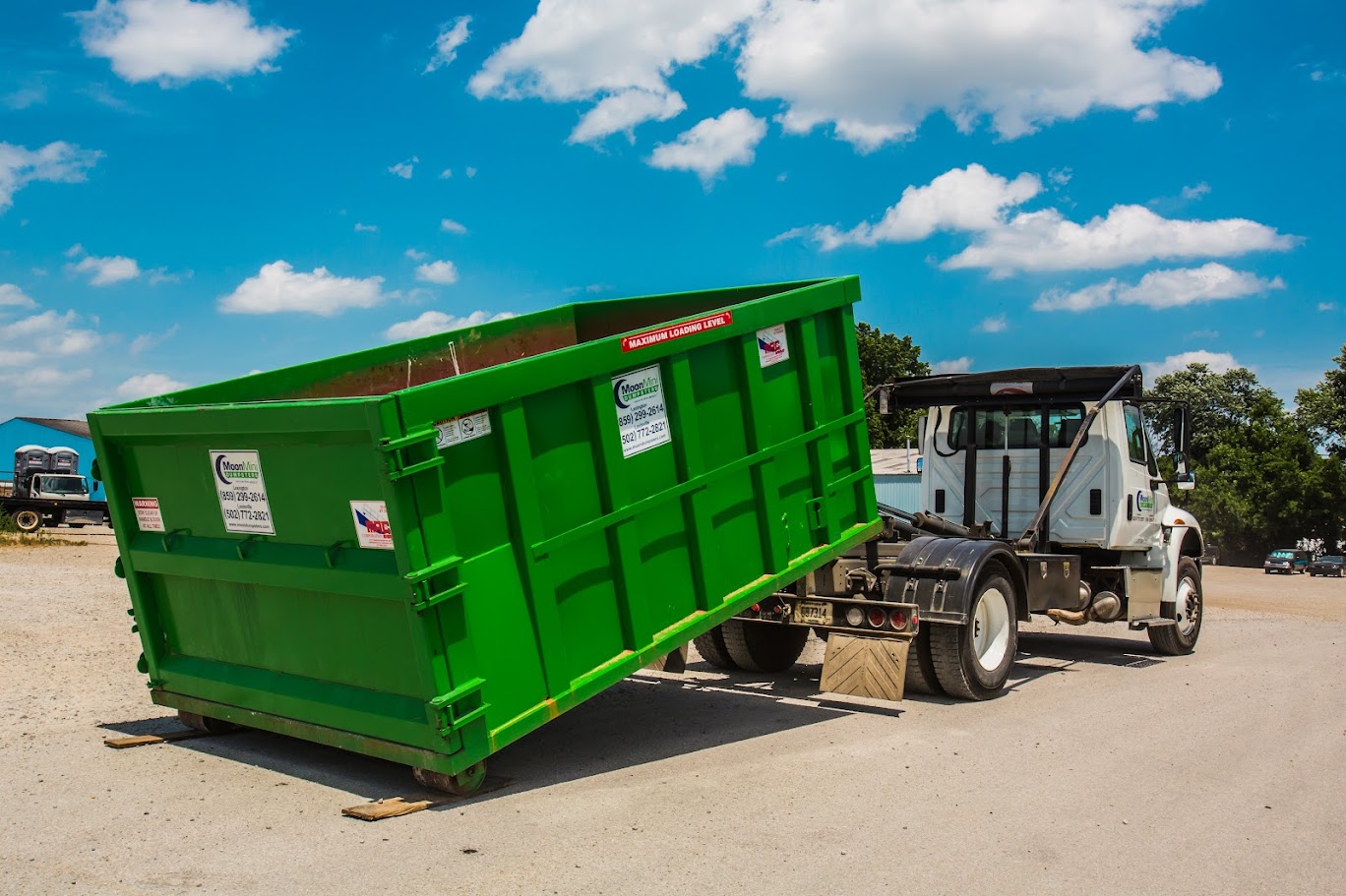 Toss•It  On-demand, Same Day, Roll-off Dumpster Rentals